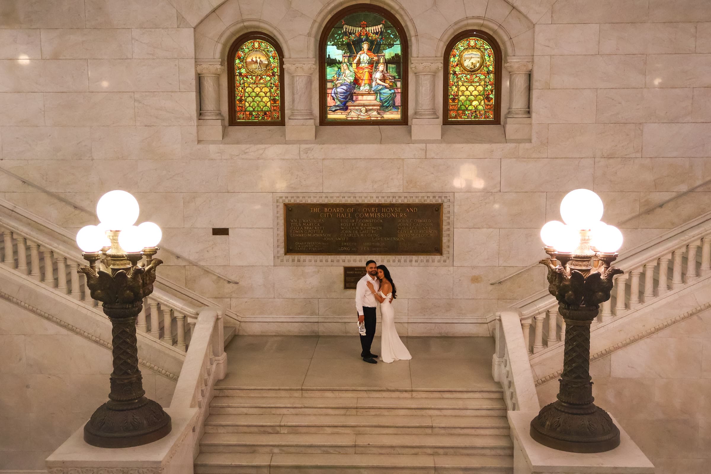 Danilo and Jotse standing together on the courthouse staircase